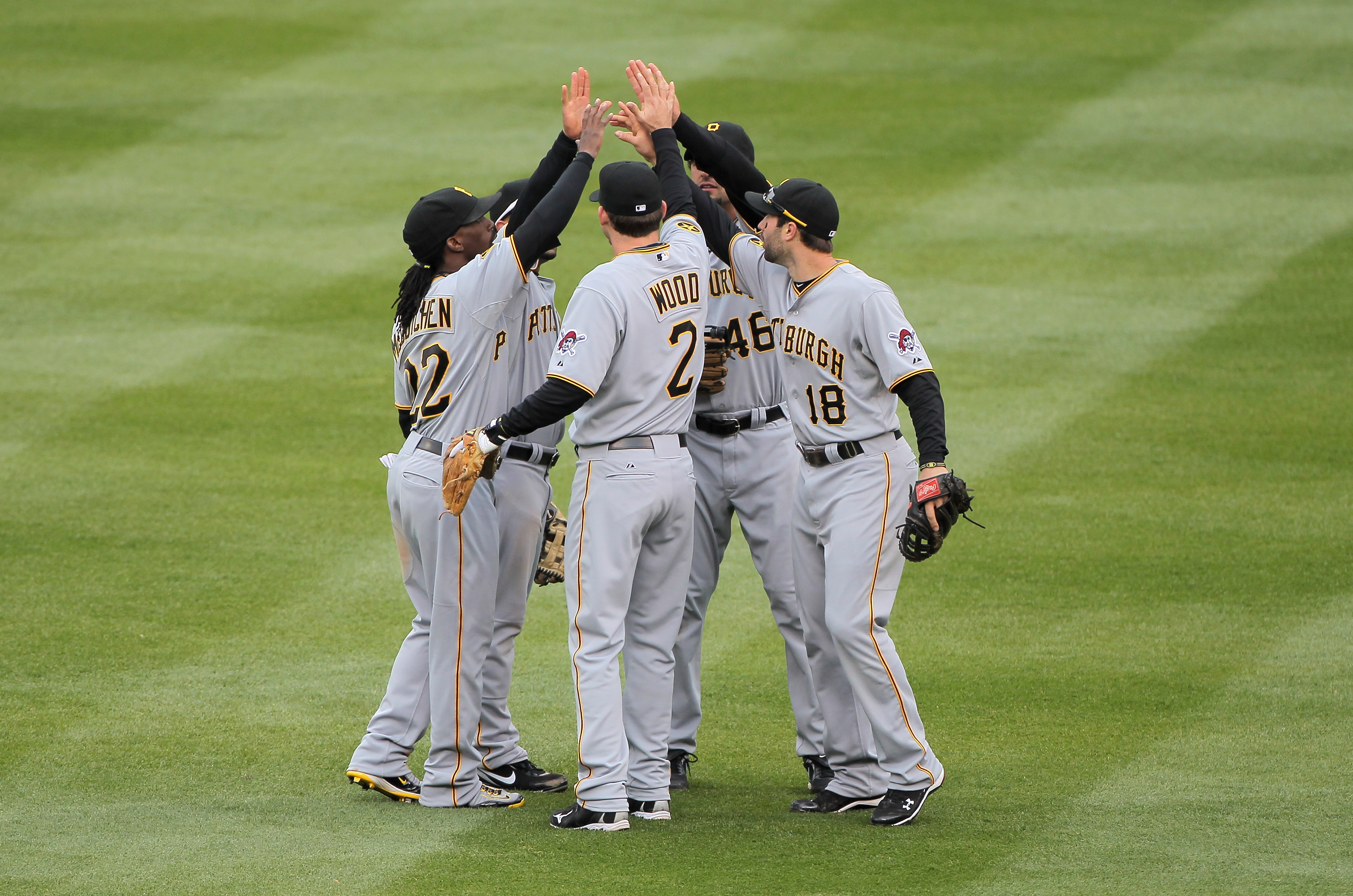 Pittsburgh Pirates' Andrew McCutchen (22) celebrates with Xavier