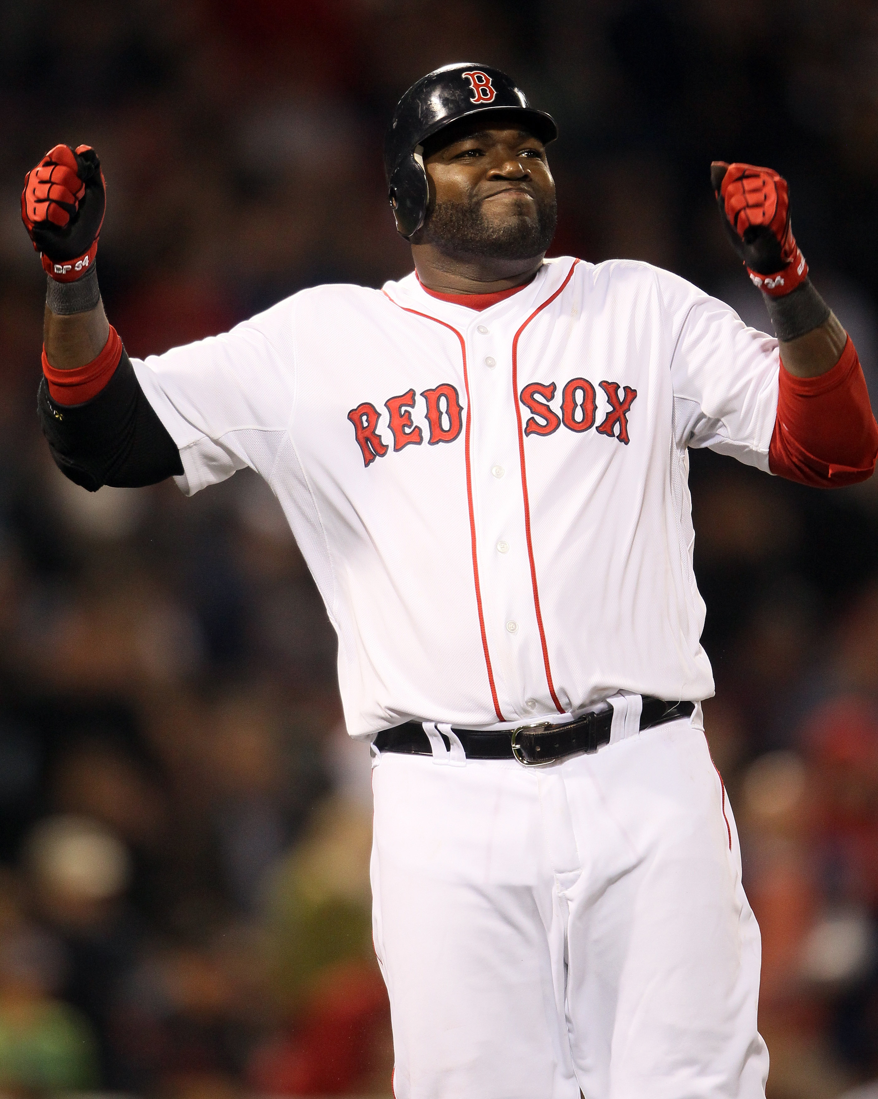 BOSTON, MA - APRIL 30: David Ortiz #34 of the Boston Red Sox reacts after hit a fly out against the Seattle Mariners on April 30, 2011 at Fenway Park in Boston, Massachusetts.  (Photo by Elsa/Getty Images)