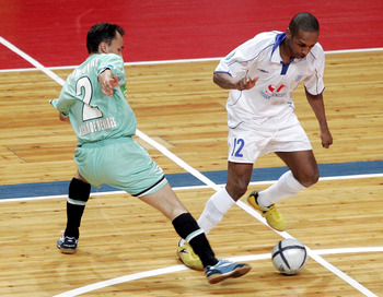 MOSCOW - MAY 7: Pele (R) of Dinamo Moscow competes against Markinio of Boomerang Interviu FS  during UEFA Futsal Cup final on May 7, 2006 in Moscow, Russia.  (Photo by Dmitry Korotaev/Pressphotos/Getty Images)