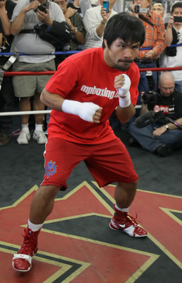 HOLLYWOOD, CA - APRIL 20:  Manny Pacquiao of the Philippines trains inside the ring during a media workout at the Wild Card Boxing Club on April 20, 2011 in Hollywood, California.  (Photo by Jeff Gross/Getty Images)