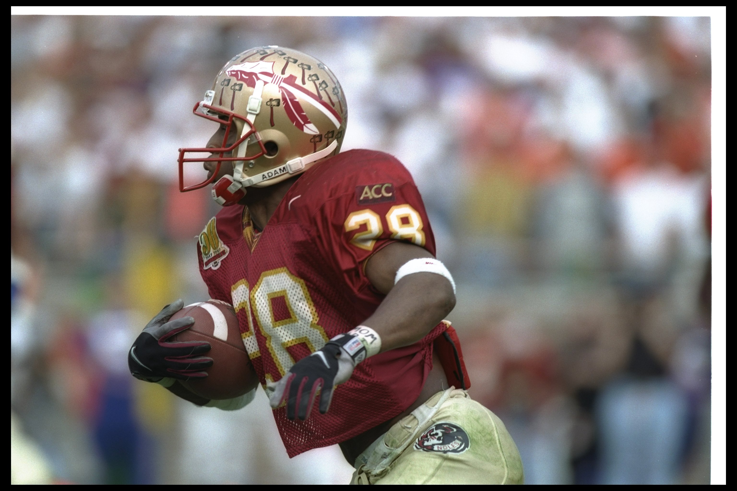 Running back Warrick Dunn of the Tampa Bay Buccaneers in action News  Photo - Getty Images