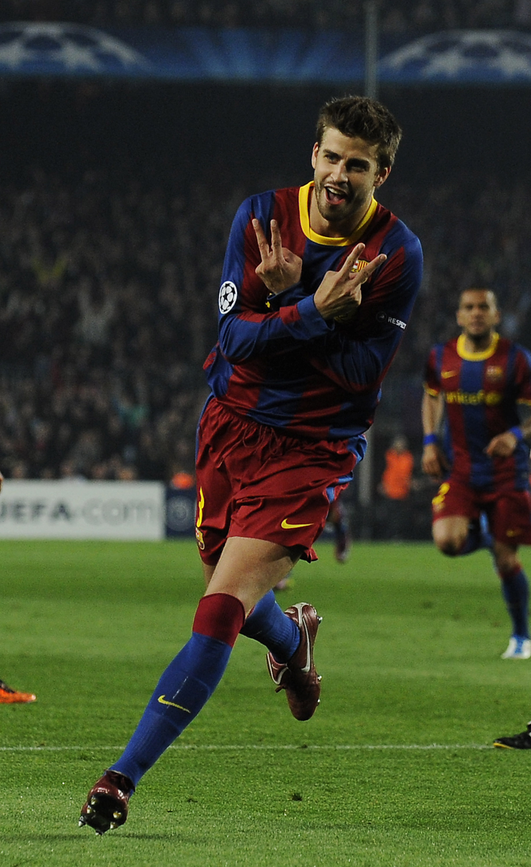 BARCELONA, SPAIN - APRIL 06:  Gerard Pique of FC Barcelona celebrates after scoring his team's third goal during the UEFA Champions League quarter final first leg match between Barcelona and Shakhtar Donetsk at the Camp Nou Stadium on April 6, 2011 in Bar