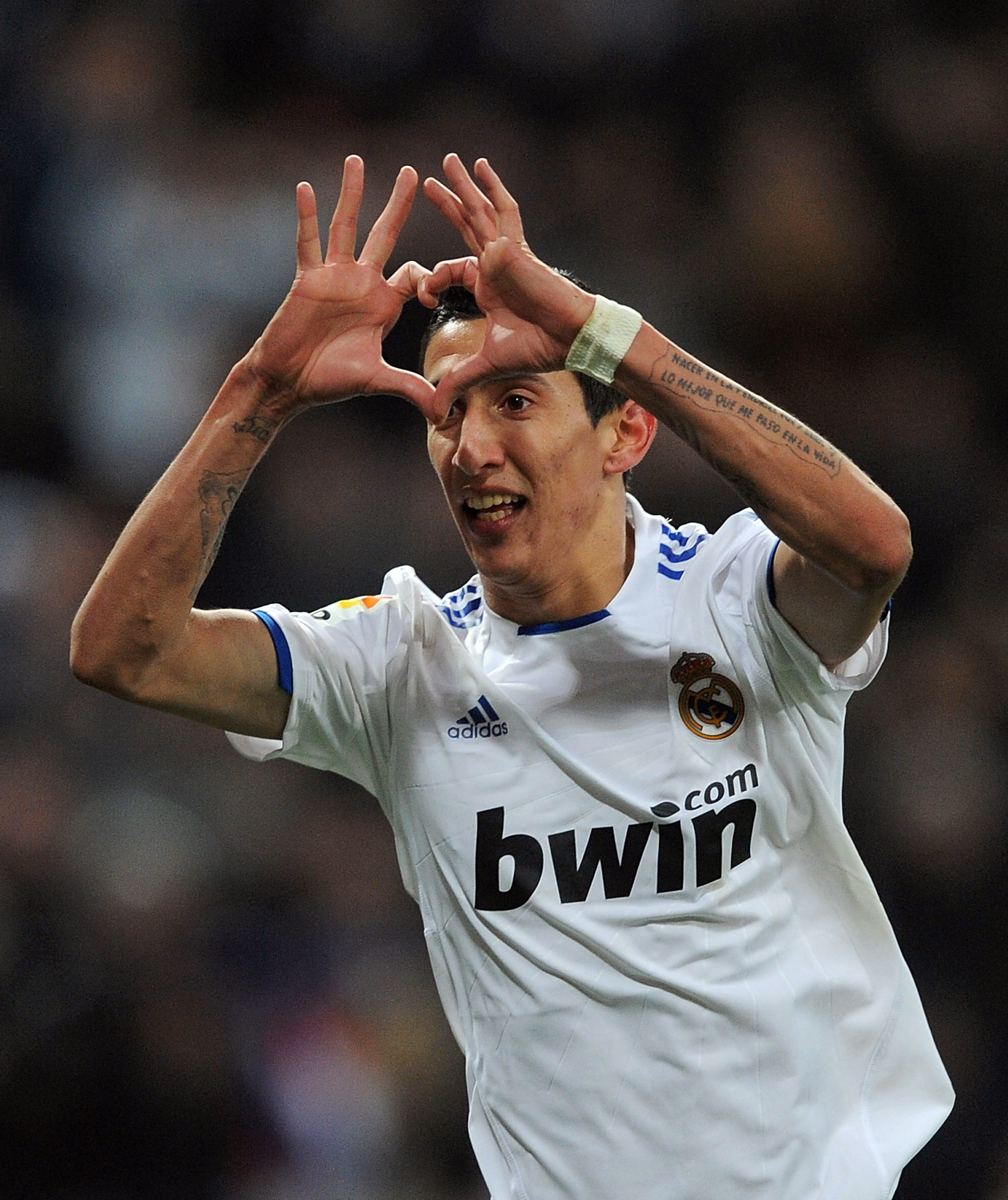 MADRID, SPAIN - MARCH 03:  Angel Di Maria of Real Madrid of Real Madrid celebrates after scoring Real''s second goal during the La Liga match bewteen Real Madrid and Malaga at Estadio Santiago Bernabeu on March 3, 2011 in Madrid, Spain.  (Photo by Denis D