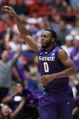 TUCSON, AZ - MARCH 19:  Jacob Pullen #0 of the Kansas State Wildcats celebrates during theior game against the Wisconsin Badgers during the third round of the 2011 NCAA men's basketball tournament at McKale Center on March 19, 2011 in Tucson, Arizona.  (P