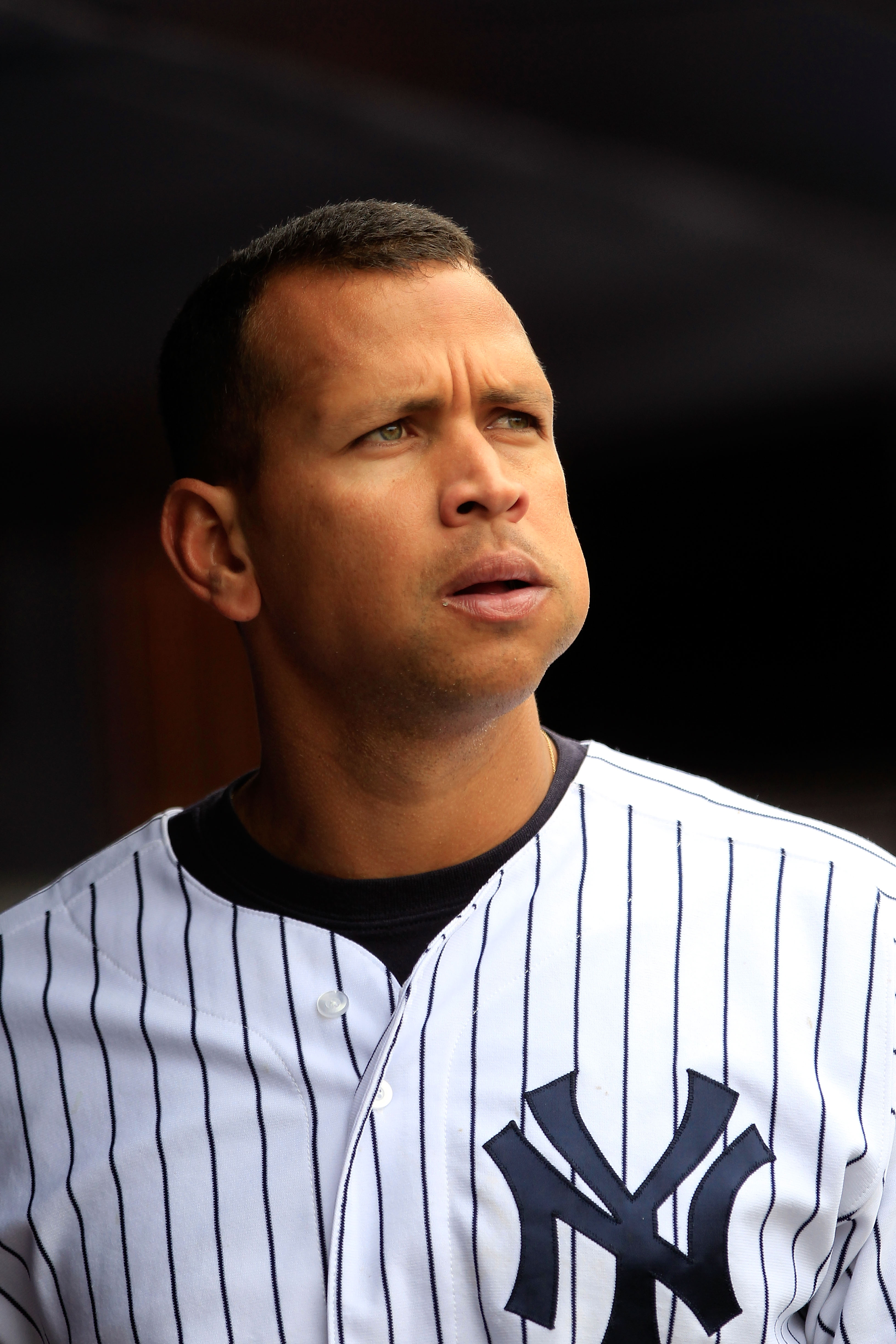 NEW YORK, NY - MAY 01:  Alex Rodriguez #13 of the New York Yankees looks on from the dugout during the game against the Toronto Blue Jays at Yankee Stadium on May 1, 2011 in the Bronx borough of New York City. The Yankees defeated the Blue Jays 5-2.  (Pho