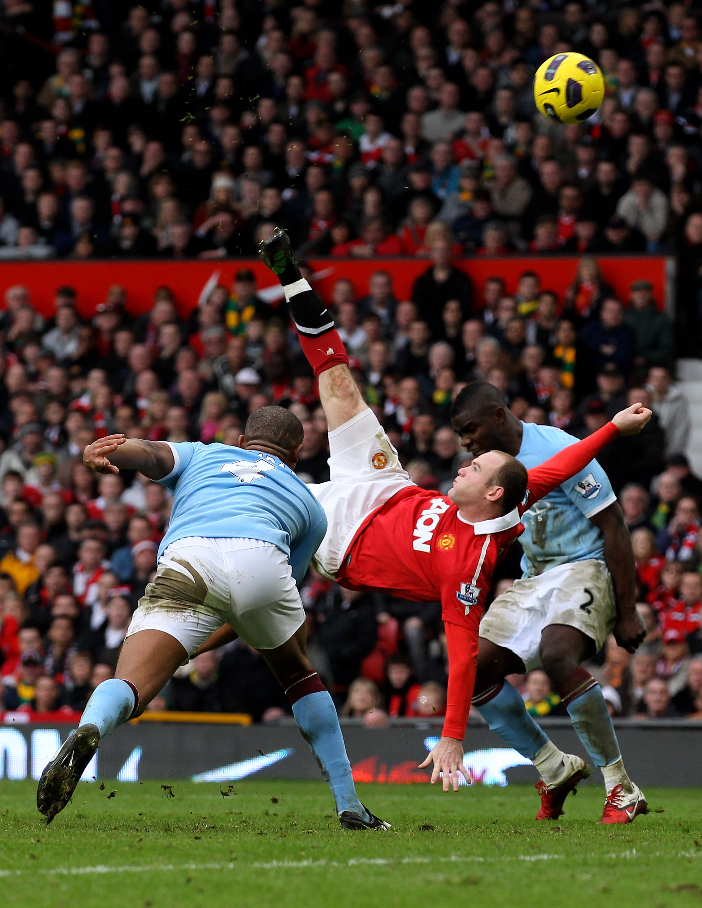 MANCHESTER, ENGLAND - FEBRUARY 12:  Wayne Rooney of Manchester United scores a goal from an overhead kick during the Barclays Premier League match between Manchester United and Manchester City at Old Trafford on February 12, 2011 in Manchester, England.