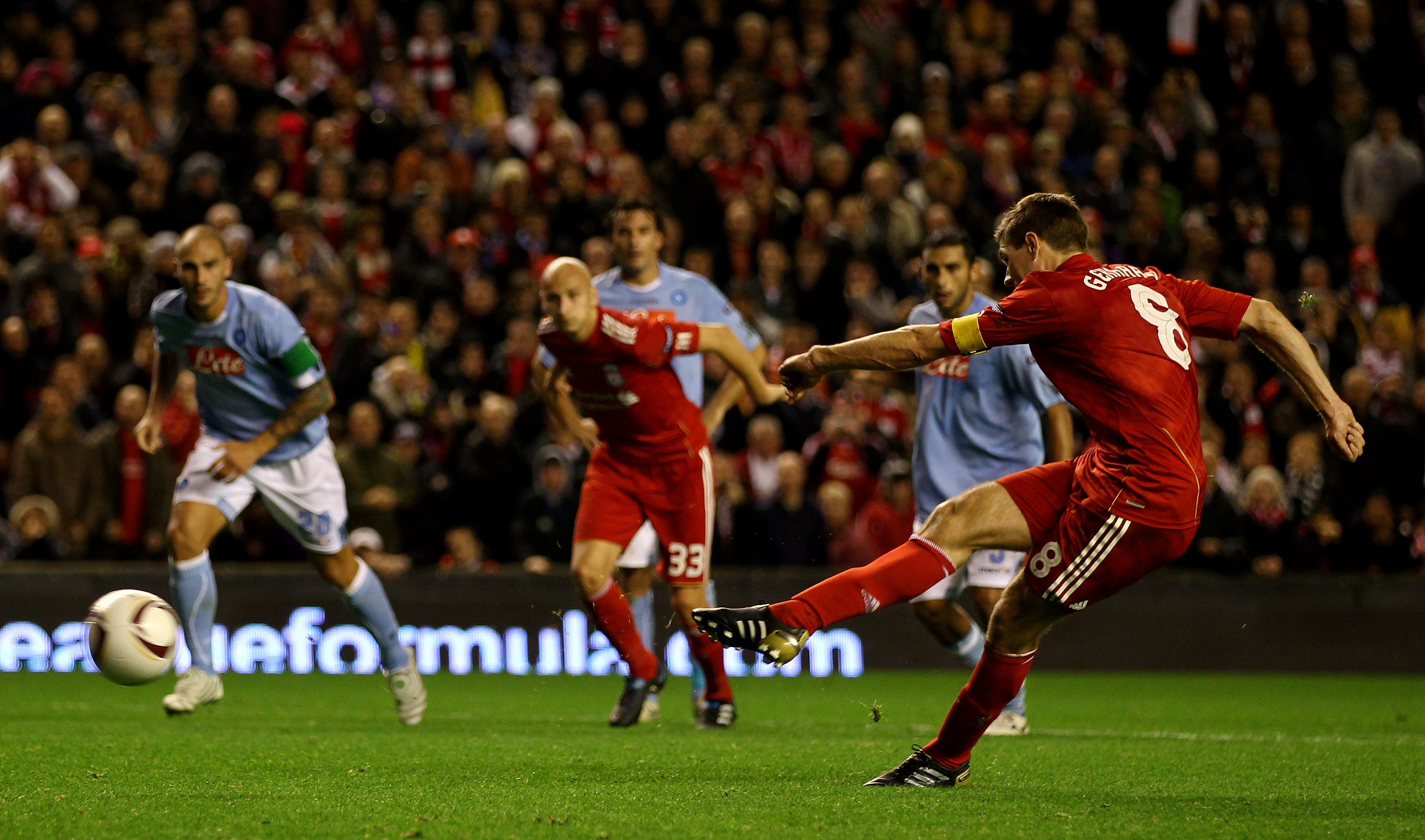 LIVERPOOL, ENGLAND - NOVEMBER 04:  Steven Gerrard of Liverpool scores his team's second goal from the penalty spot during the UEFA Europa League Group K match beteween Liverpool and SSC Napoli at Anfield on November 4, 2010 in Liverpool, England.  (Photo