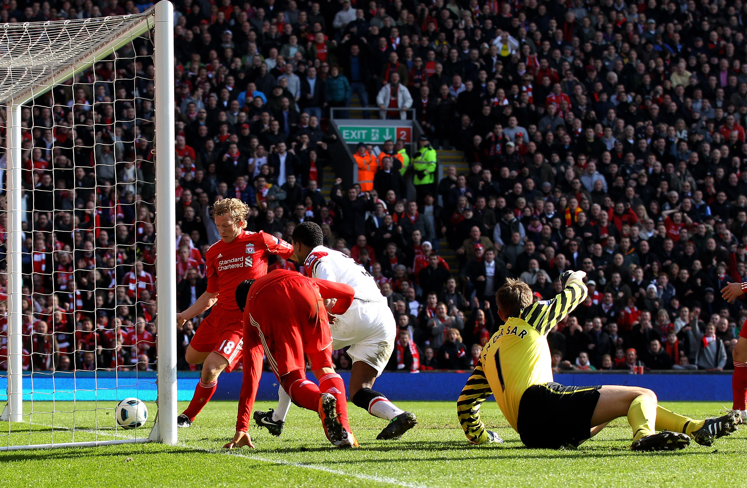LIVERPOOL, UNITED KINGDOM - MARCH 06:  Dirk Kuyt of Liverpool scores the opening goal during the Barclays Premier League match between Liverpool and Manchester United at Anfield on March 6, 2011 in Liverpool, England. (Photo by Alex Livesey/Getty Images)
