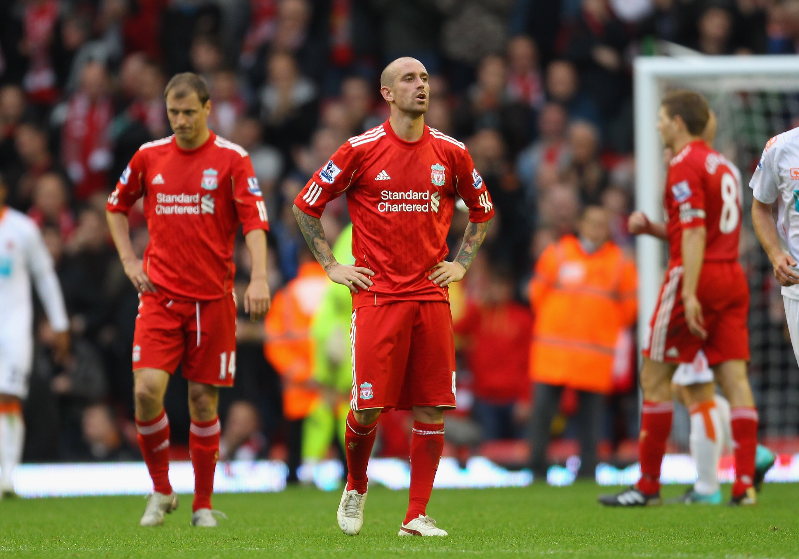 LIVERPOOL, ENGLAND - OCTOBER 03:  Raul Meireles of Liverpool looks dejected after defeat to Blackpool in the Barclays Premier League match between Liverpool and Blackpool at Anfield on October 3, 2010 in Liverpool, England.  (Photo by Alex Livesey/Getty I