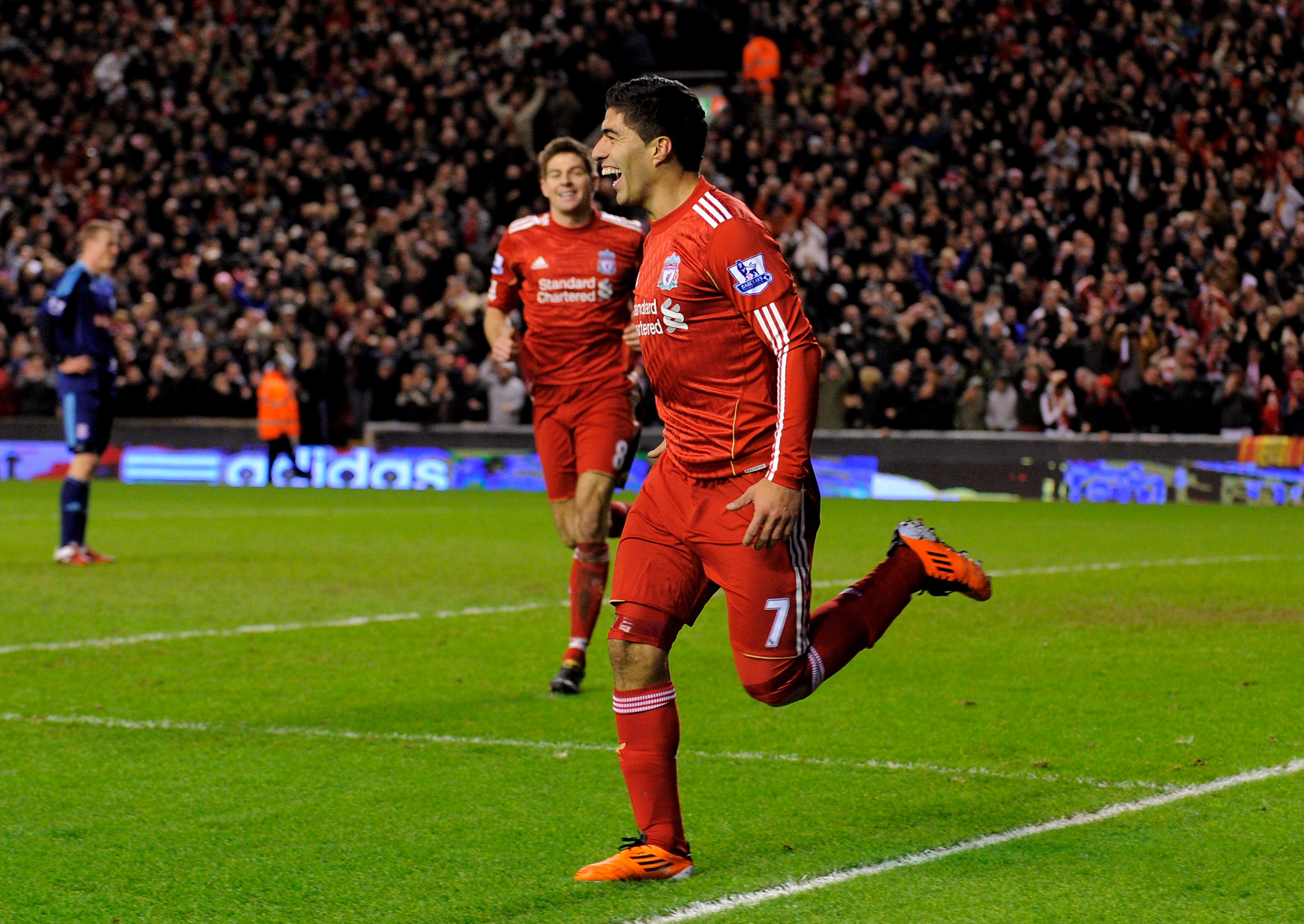 LIVERPOOL, ENGLAND - FEBRUARY 02: Luis Suarez of Liverpool celebrates after scoring the 2-0 goal during the Barclays Premier League match between Liverpool and Stoke City at Anfield on February 2, 2011 in Liverpool, England. (Photo by Michael Regan/Getty