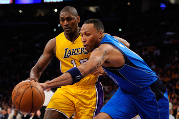 LOS ANGELES, CA - MAY 02:  Shawn Marion #0 of the Dallas Mavericks and Ron Artest #15 of the Los Angeles Lakers go after a loose ball in the second half in Game One of the Western Conference Semifinals in the 2011 NBA Playoffs at Staples Center on May 2,