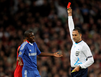 MANCHESTER, ENGLAND - APRIL 12:  Referee Olegario Benquerenca shows a red card to Ramires of Chelsea during the UEFA Champions League Quarter Final second leg match between Manchester United and Chelsea at Old Trafford on April 12, 2011 in Manchester, Eng