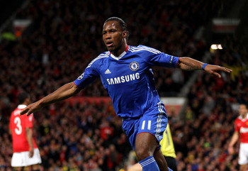 MANCHESTER, ENGLAND - APRIL 12:  Didier Drogba of Chelsea celebrates scoring his team's first goal during the UEFA Champions League Quarter Final second leg match between Manchester United and Chelsea at Old Trafford on April 12, 2011 in Manchester, Engla