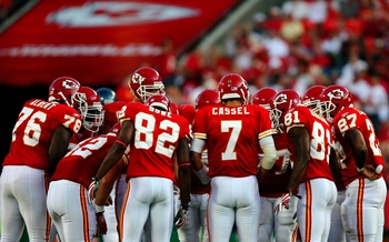 KANSAS CITY, MO - AUGUST 29: Quarterback Matt Cassel #7 of the Kansas City Chiefs huddles up with his teammates on offense2 including Dwayne Bowe #82 and Devard Darling #81 against the Seattle Seahawks during their preseason game at Arrowhead Stadium on A