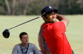 CHUNCHEON, SOUTH KOREA - APRIL 14:  U.S. golfer Tiger Woods participates in a golf teaching clinic for South Korean juniors during a Nike Golf 'Make It Happen' event at Jade Palace Golf Club on April 14, 2011 in Chuncheon, South Korea.  (Photo by Chung Su