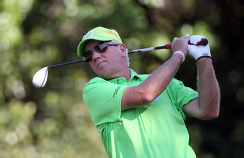 PALM HARBOR, FL - MARCH 17:  John Daly plays a shot during the first round of the Transitions Championship at Innisbrook Resort and Golf Club on March 17, 2011 in Palm Harbor, Florida.  (Photo by Sam Greenwood/Getty Images)