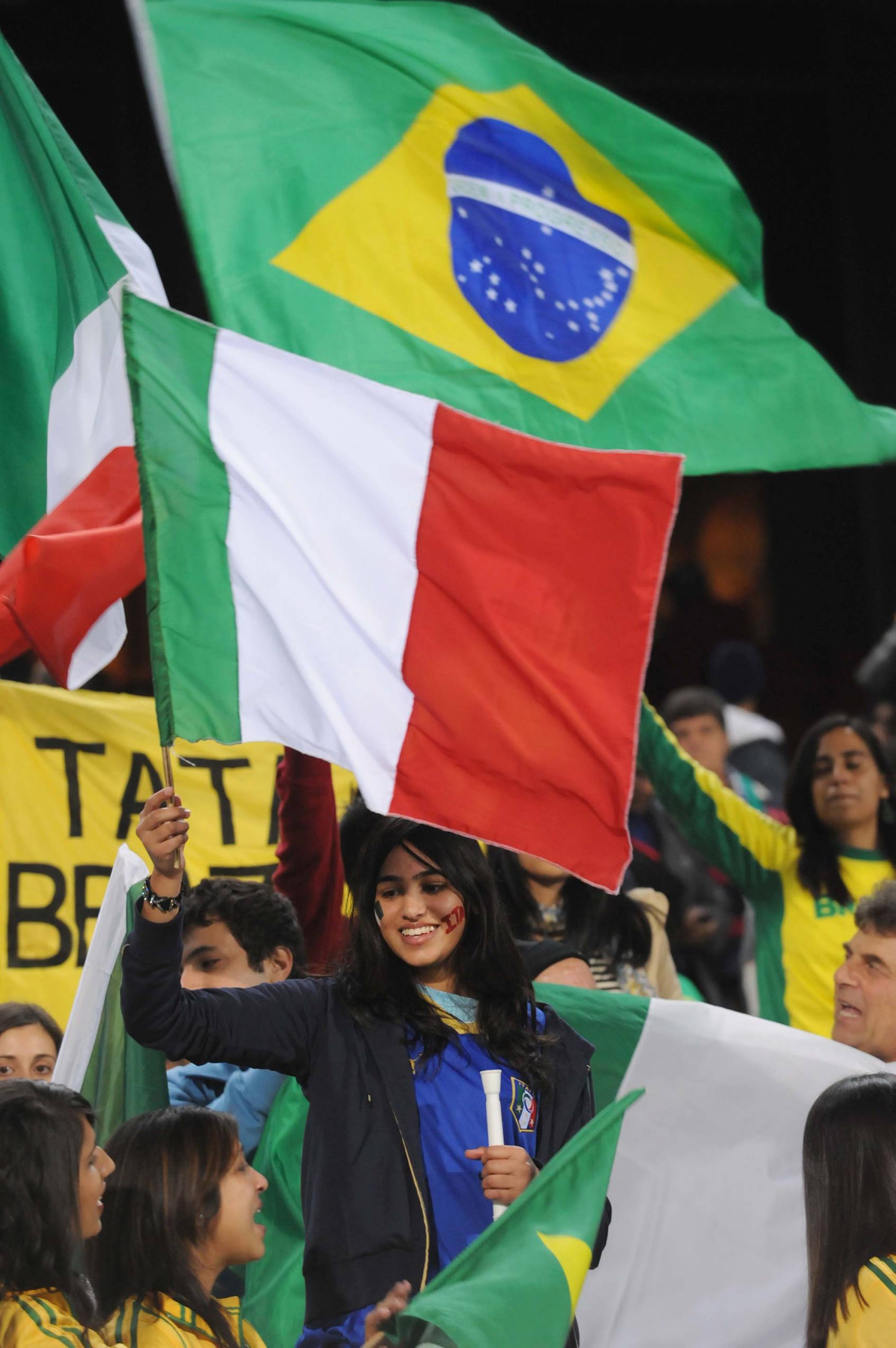 PRETORIA, SOUTH AFRICA - JUNE 21:  Italian and Brazilian fans wave flags during the FIFA Confederations Cup match between Italy and Brazil at the Loftus Versfeld Stadium on June 21, 2009 in Pretoria, South Africa.  (Photo by Lee Warren/Gallo Images/Getty 