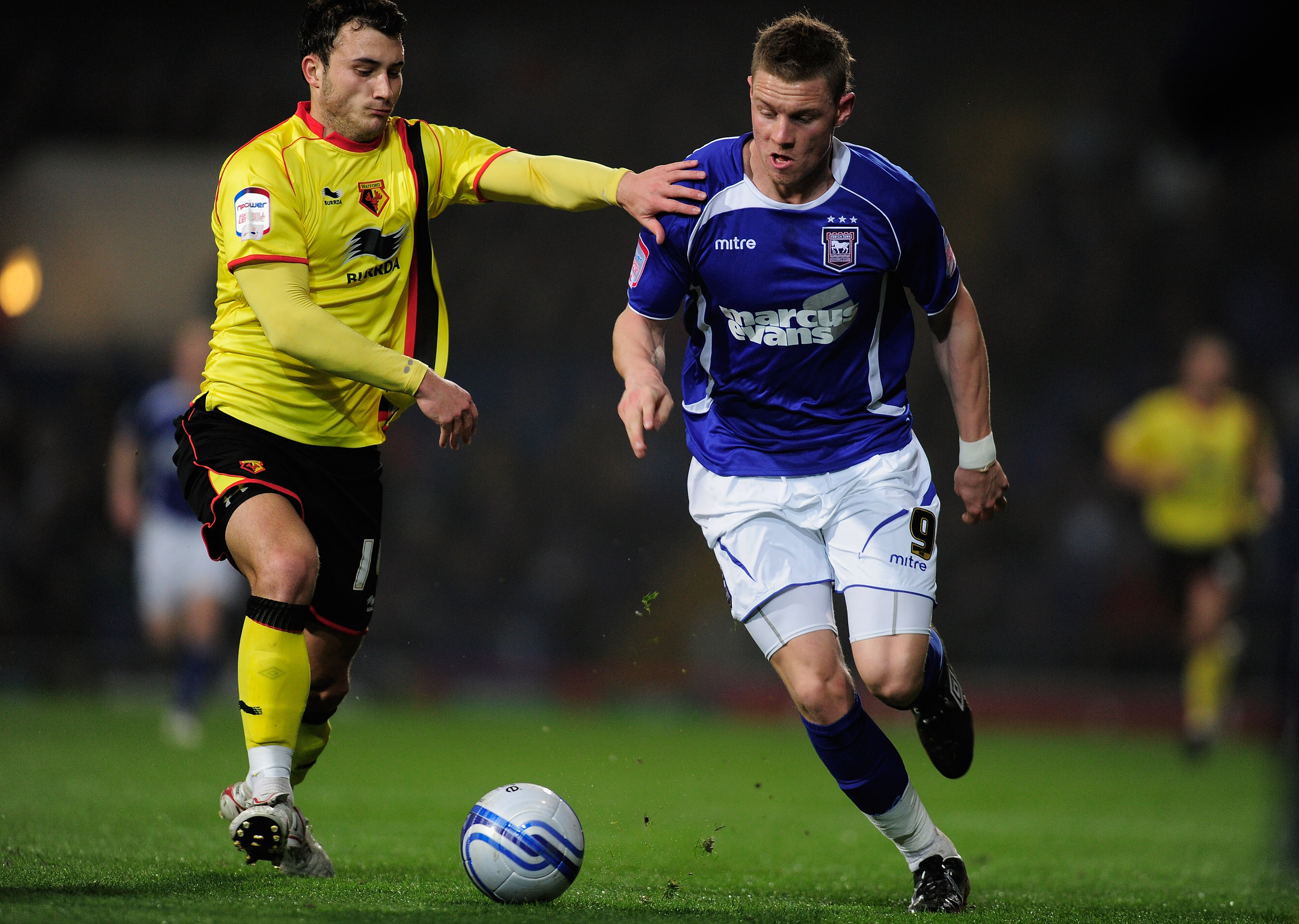 IPSWICH, ENGLAND - MARCH 15:  Connor Wickham of Ipswich Town battles with Will Buckley of Watford during the npower Championship match between Ipswich Town and Watford at Portman Road on March 15, 2011 in Ipswich, England.  (Photo by Jamie McDonald/Getty