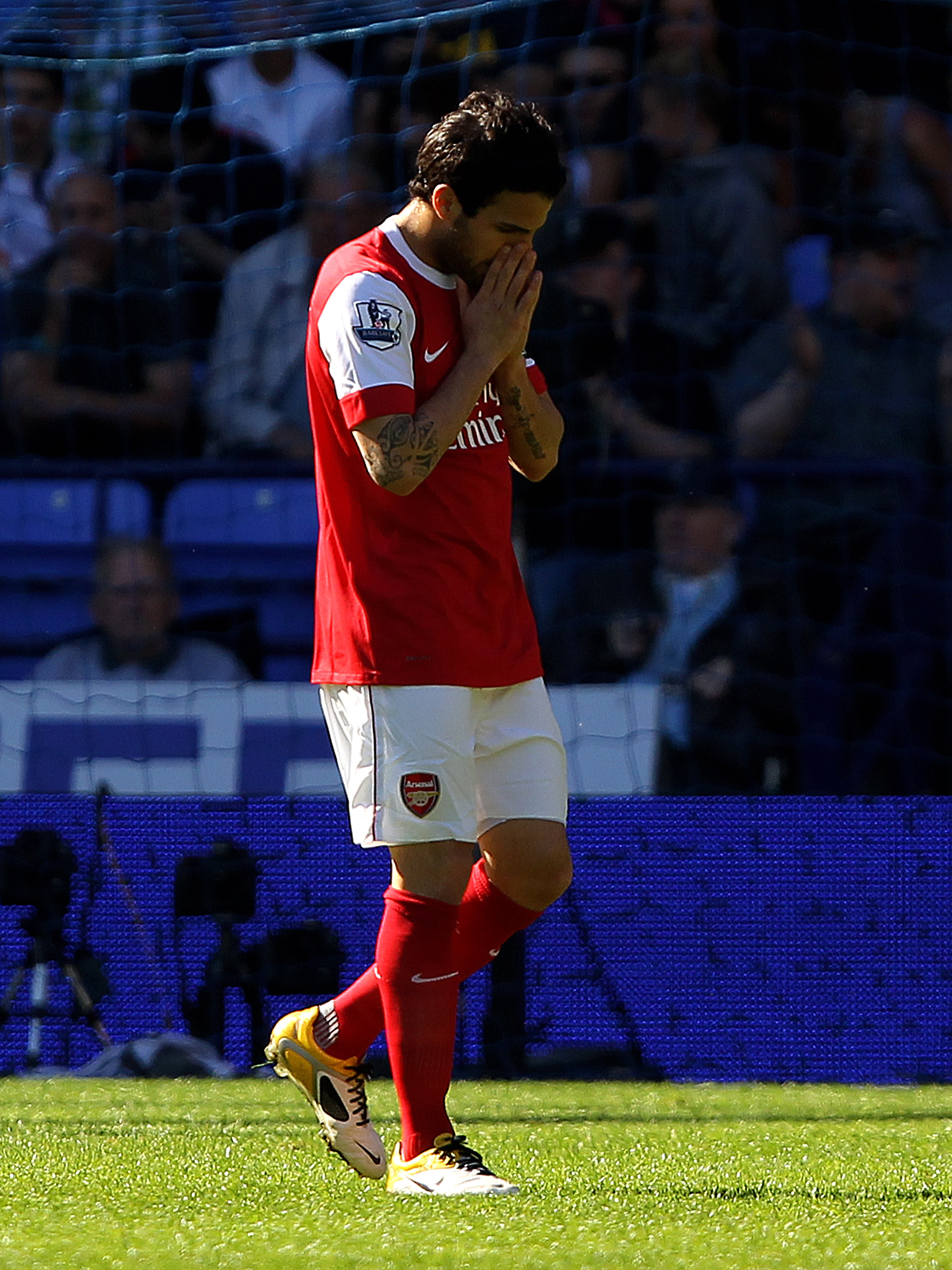 BOLTON, ENGLAND - APRIL 24:  Cesc Fabregas of Arsenal reacts during the Barclays Premier League match between Bolton Wanderers and Arsenal at the Reebok Stadium on April 24, 2011 in Bolton, England.  (Photo by Clive Brunskill/Getty Images)