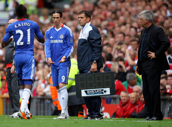 MANCHESTER, ENGLAND - MAY 08:   Fernando Torres of Chelsea comes on as a substitute for team mate Salomon Kalou during the Barclays Premier League match between Manchester United and Chelsea at Old Trafford on May 8, 2011 in Manchester, England.  (Photo b
