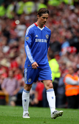 MANCHESTER, ENGLAND - MAY 08:  Fernando Torres of Chelsea walks off at the end of the Barclays Premier League match between Manchester United and Chelsea at Old Trafford on May 8, 2011 in Manchester, England.  (Photo by Alex Livesey/Getty Images)