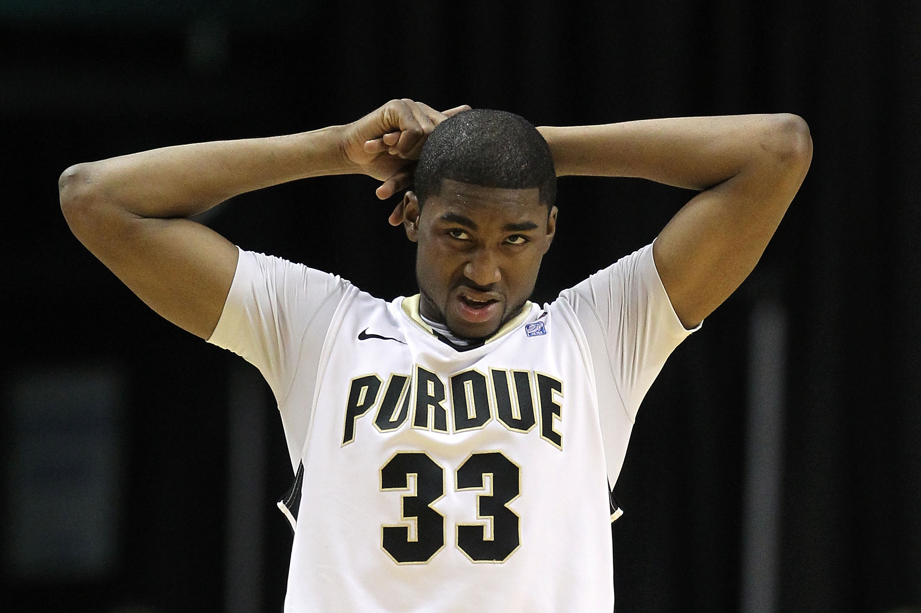 INDIANAPOLIS, IN - MARCH 11:  E'Twaun Moore #33 of the Purdue Boilermakers looks on dejected against the Michigan State Spartans during the quarterfinals of the 2011 Big Ten Men's Basketball Tournament at Conseco Fieldhouse on March 11, 2011 in Indianapol