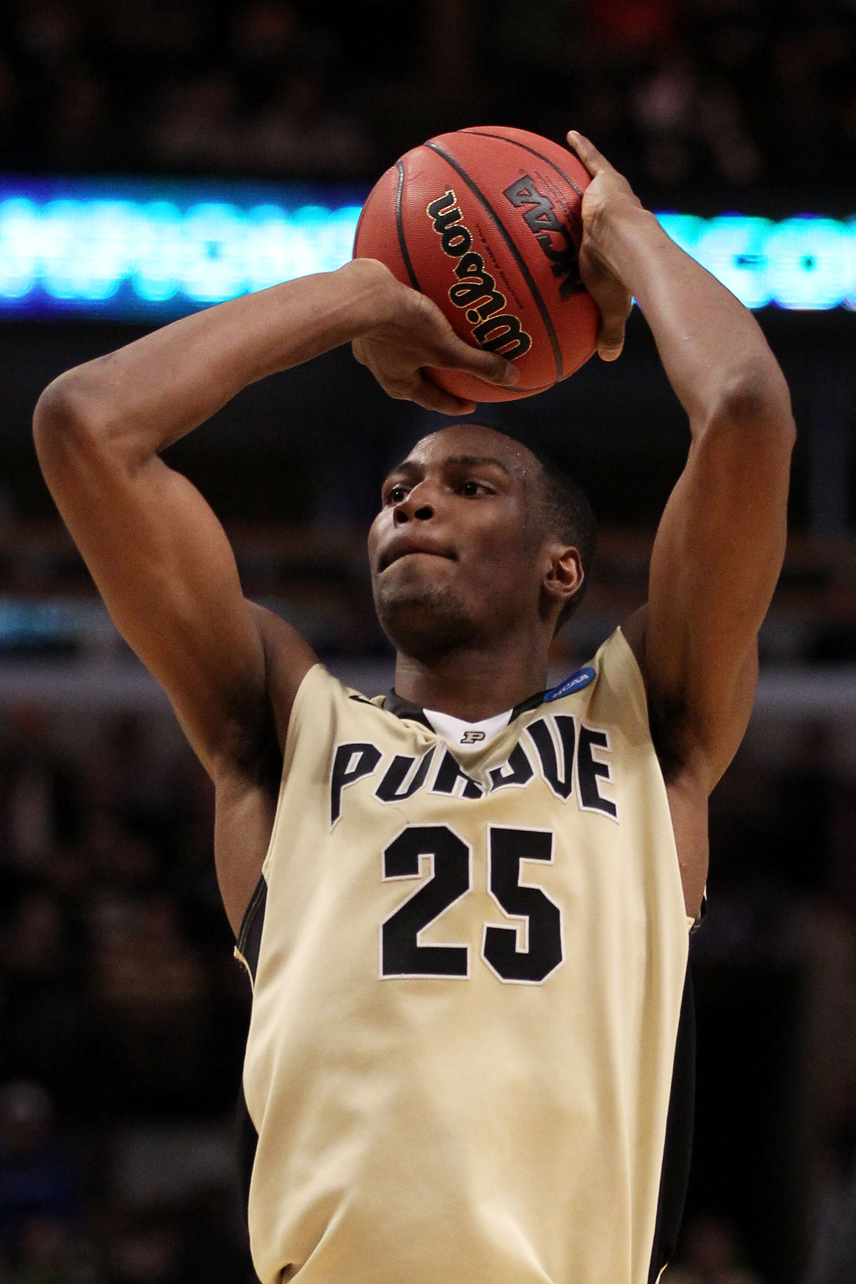 CHICAGO, IL - MARCH 20: JaJuan Johnson #25 of the Purdue Boilermakers shoots against the Virginia Commonwealth Rams in the first half during the third round of the 2011 NCAA men's basketball tournament at the United Center on March 20, 2011 in Chicago, Il