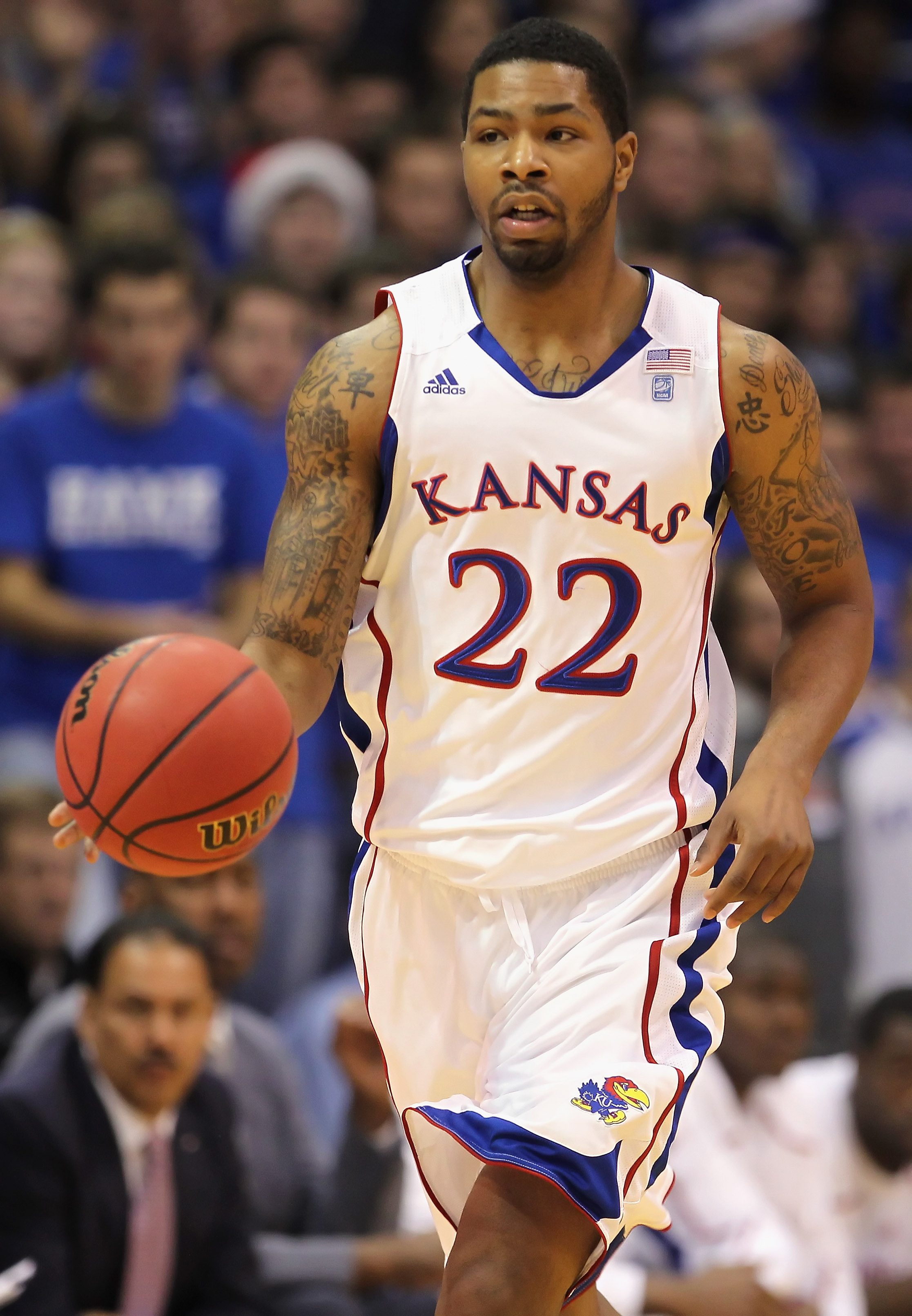 LAWRENCE, KS - DECEMBER 18:  Marcus Morris #22 of the Kansas Jayhawks in action during the game against the USC Trojans on December 18, 2010 at Allen Fieldhouse in Lawrence, Kansas.  (Photo by Jamie Squire/Getty Images)