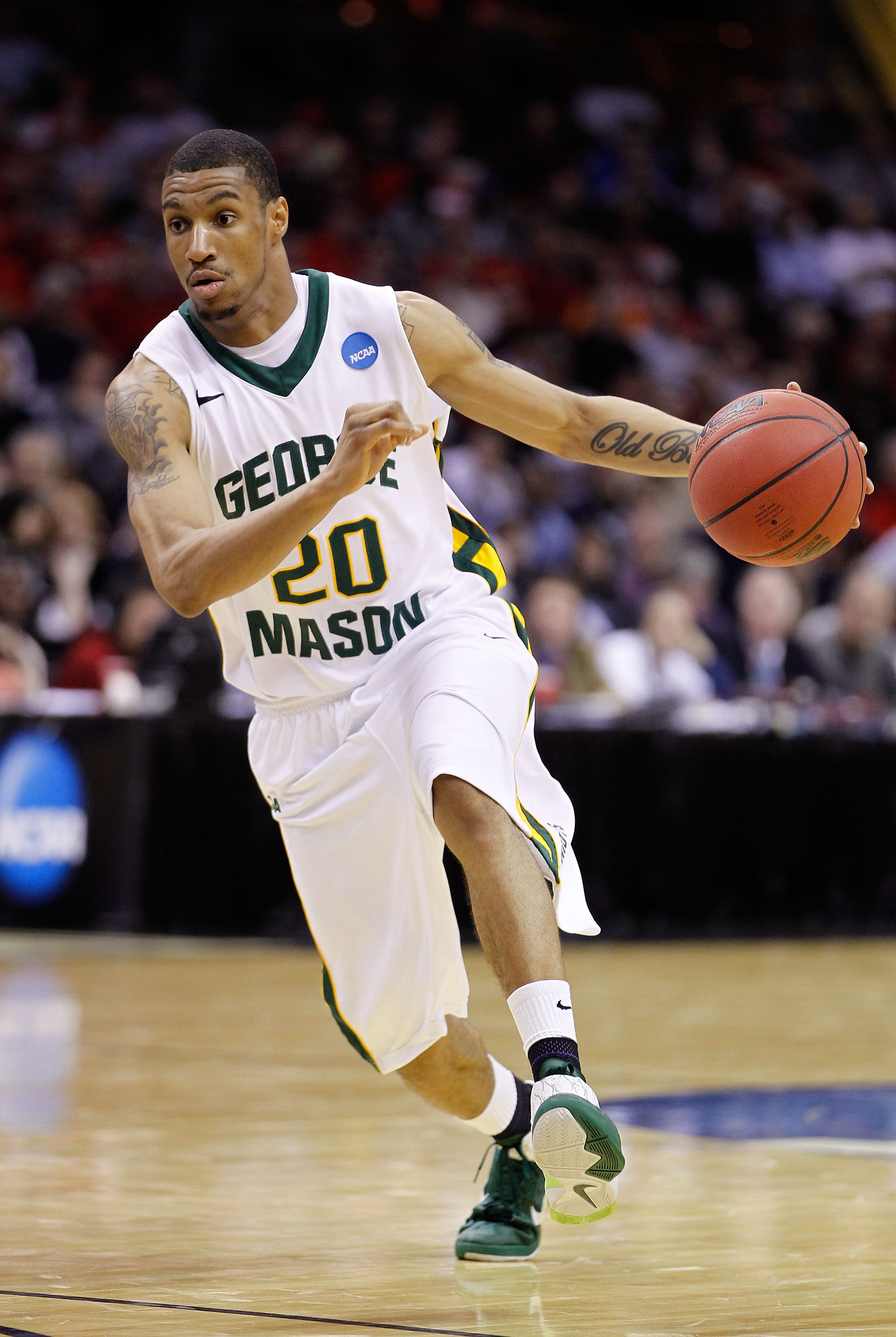 CLEVELAND, OH - MARCH 18: Cam Long #20 of the George Mason Patriots handles the ball against the Xavier Musketeers during the second round of the 2011 NCAA men's basketball tournament at Quicken Loans Arena on March 18, 2011 in Cleveland, Ohio.  (Photo by