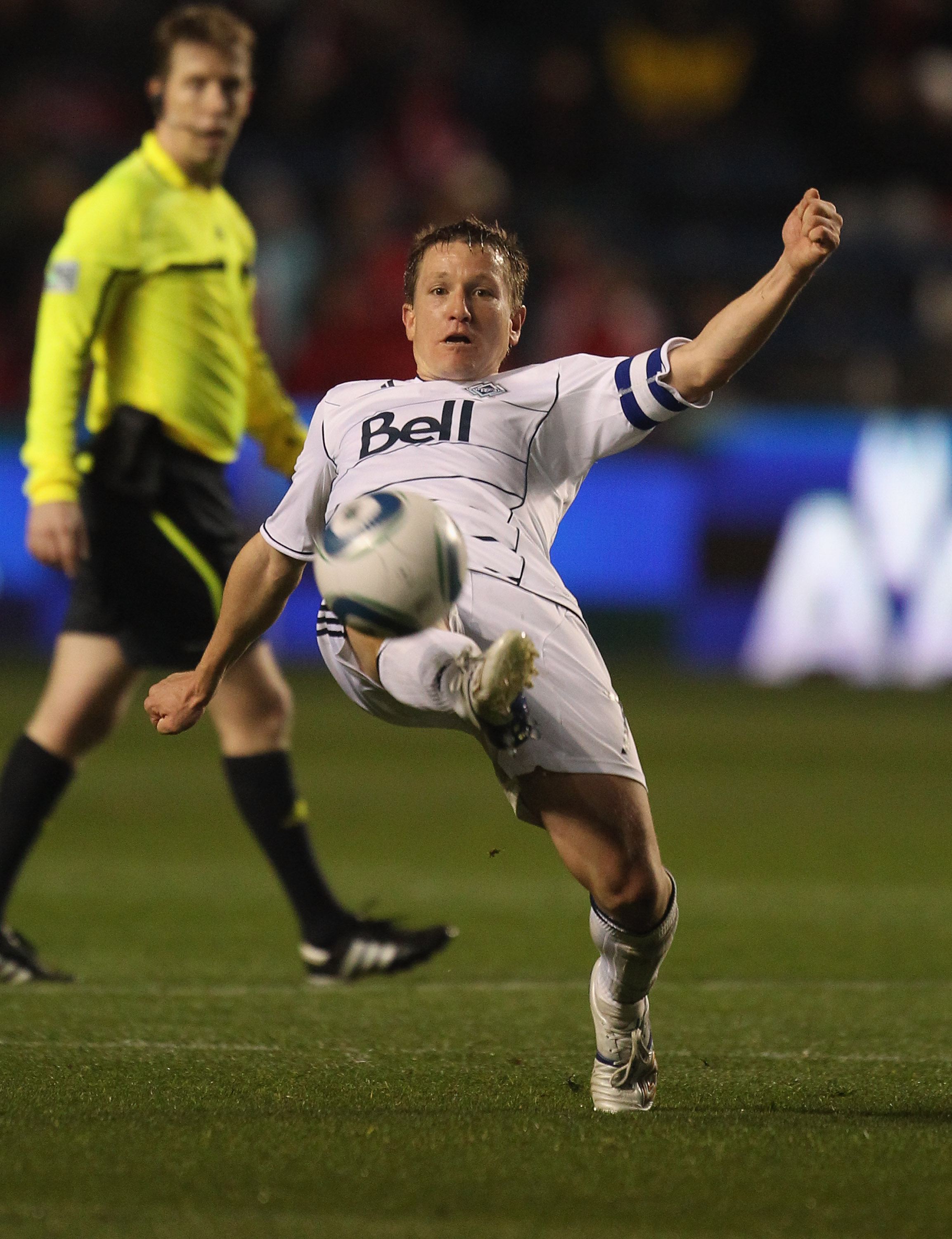 BRIDGEVIEW, IL - MAY 07: Terry Dunfield #7 of the Vancouver Whitecaps FC passes the ball against the Chicago Fire during an MLS match at Toyota Park on May 7, 2011 in Bridgeview, Illinois. The Fire and the Whitecaps tied 0-0. (Photo by Jonathan Daniel/Get