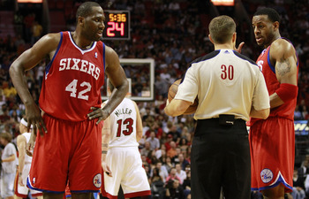 MIAMI, FL - MARCH 25:  Guard Andr Iguodala #9  and Guard Elton Brand #42 of the Philadelphia Sixers argue with the referee against the Miami Heat at American Airlines Arena on March 25, 2011 in Miami, Florida. The Heat defeated the Sixers 111-99. NOTE TO
