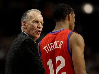 CHICAGO, IL - DECEMBER 21: Head coach Doug Collins of the Philadelphia 76ers gives instructions to Evan Turner #12 during a game against the Chicago Bulls at the United Center on December 21, 2010 in Chicago, Illinois. The Bulls defeated the 76ers 121-76.