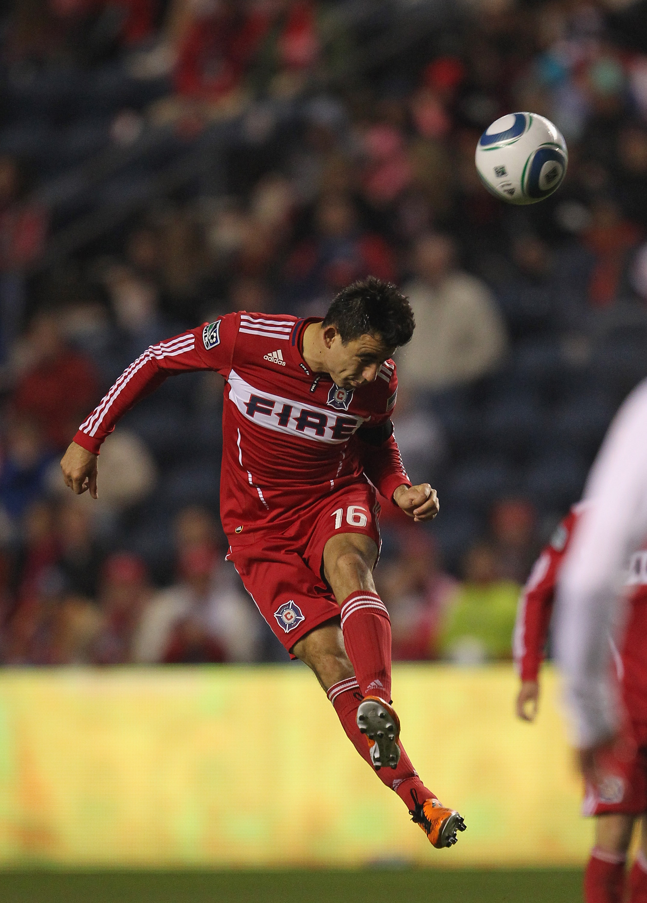 BRIDGEVIEW, IL - MAY 07: Marco Pappa #16 of the Chicago Fire heads the ball up the field against the Vancouver Whitecaps FC during an MLS match at Toyota Park on May 7, 2011 in Bridgeview, Illinois. The Fire and the Whitecaps tied 0-0. (Photo by Jonathan