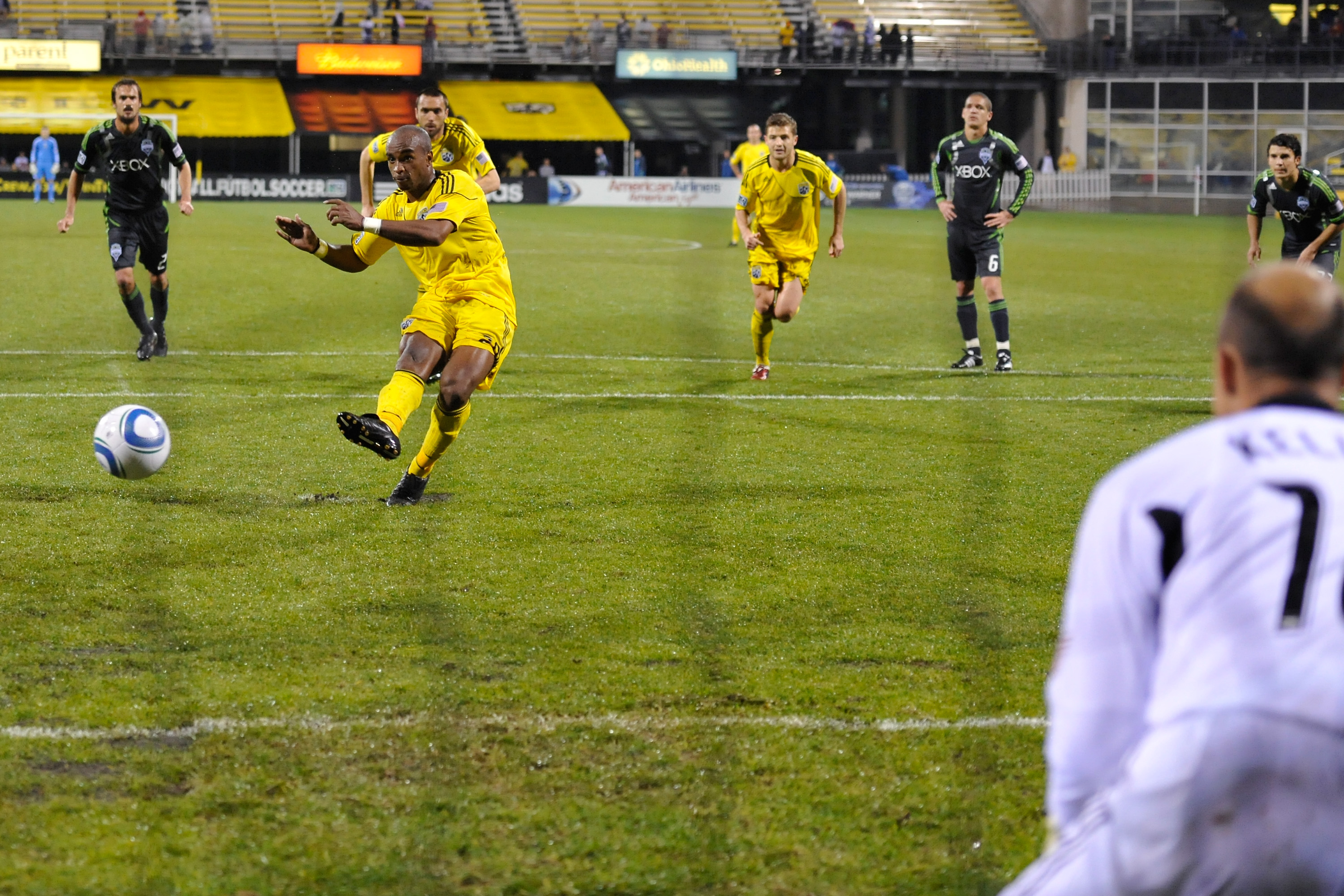 COLUMBUS, OH - MAY 7: Emilio Renteria #20 of the Columbus Crew gets goalkeeper Kasey Keller #18 of the Seattle Sounders to go the wrong direction on a successful penalty kick in the second half on May 7, 2011 at Crew Stadium in Columbus, Ohio. Columbus a
