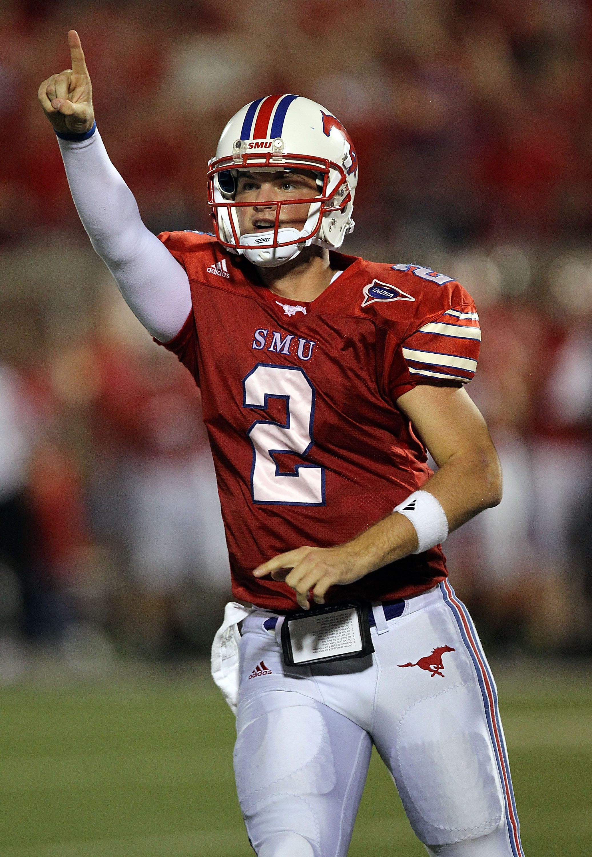 DALLAS - SEPTEMBER 24:  Quarterback Kyle Padron #2 of the SMU Mustangs celebrates a touchdown in the third quarter against the TCU Horned Frogs at Gerald J. Ford Stadium on September 24, 2010 in Dallas, Texas.  (Photo by Ronald Martinez/Getty Images)