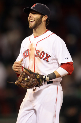 BOSTON, MA - MAY 02:  Dustin Pedroia #15 of the Boston Red Sox celebrates the win over the Los Angeles Angels on May 2, 2011 at Fenway Park in Boston, Massachusetts. The Boston Red Sox defeated the Los Angeles Angels 9-5.  (Photo by Elsa/Getty Images)