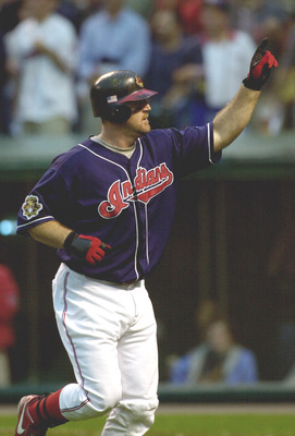 13 Oct 2001:  Jim Thome #25 of the Cleveland Indians acknowledges the crowd as he heads to the dugout after hitting a homne run in the sixth inning against the Seattle Mariners during game three of the American League Division Series at Jacobs Field in Cl