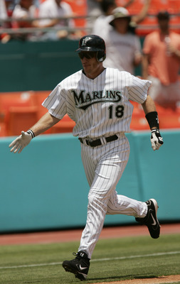MIAMI - JULY 29:  Left fielder Jeff Conine #18 of the Florida Marlins celebrates his homerun in the second inning against the Philadelphia Phillies on July 29, 2004 at Pro Player Stadium in Miami, Florida.  The Marlins defeated the Phillies 10-1. (Photo b