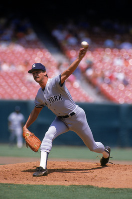 ANAHEIM, CA - 1987:  Ron Guidry #49 of the New York Yankees pitches during a game in the 1987 season against the California Angels at Anaheim Stadium in Anaheim, California.  (Photo by Tim DeFrisco/Getty Images)