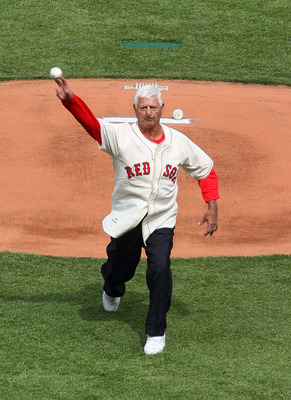 BOSTON, MA - APRIL 8:   Former Boston Red Sox Carl Yastrzemski throws out the first pitch before the game against teh New York Yankees on Opening Day at Fenway Park on April 8, 2011 in Boston, Massachusetts. (Photo by Gail Oskin/Getty Images)