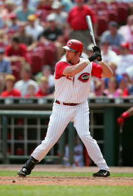 CINCINNATI, OH - JULY 21:  Infielder Sean Casey #21 of the Cincinnati Reds waits for a Chicago Cubs pitch during the game on July 21, 2005 at Great American Ballpark in Cincinnati, Ohio. The Reds won 9-6. (Photo by Andy Lyons/Getty Images)