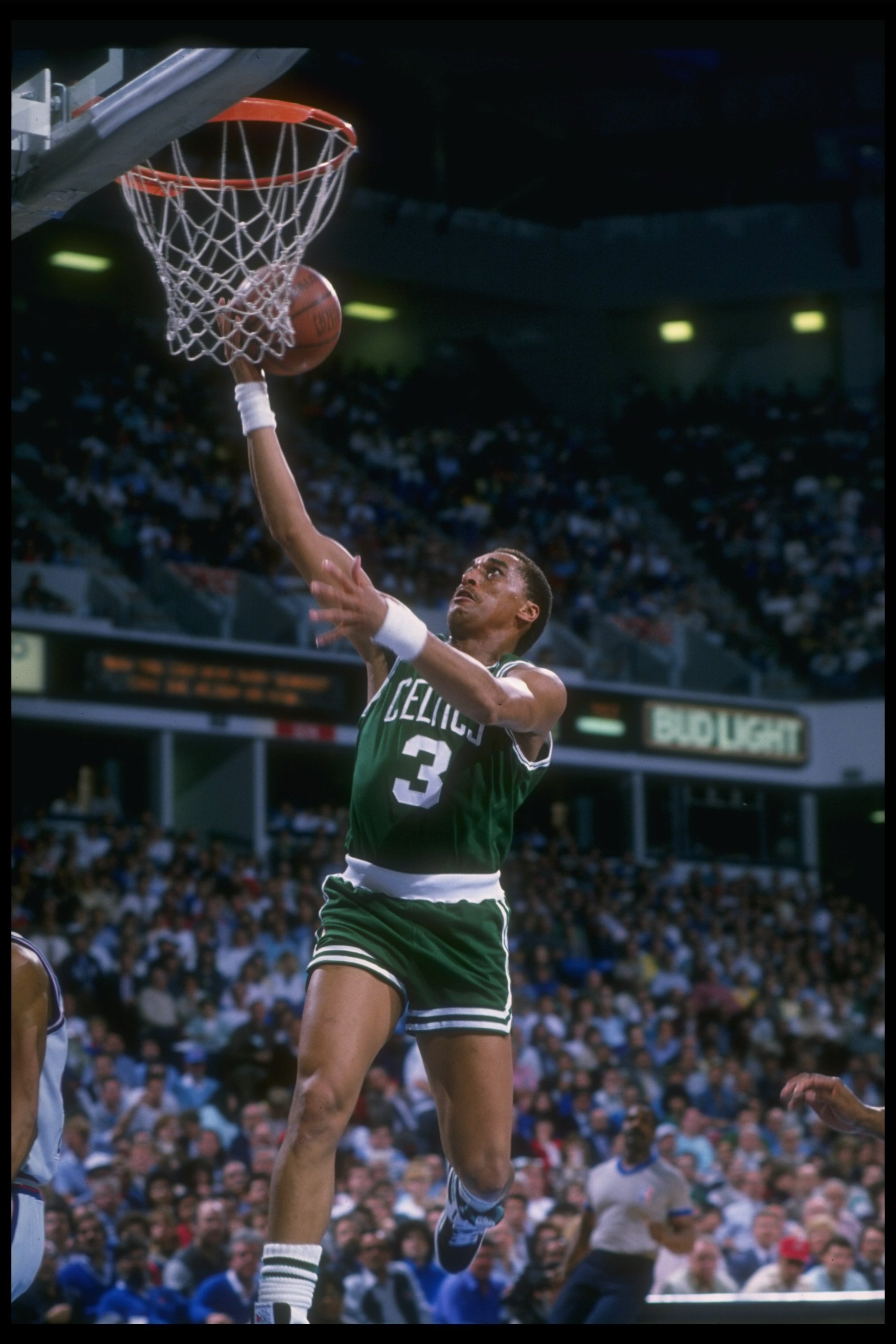 DENVER - 1988-1989:  Dennis Johnson of the Boston Celtics sinks the ball during the 1988-1989 NBA game against the Denver Nuggetts in Denver, Colorado. NOTE TO USER: User expressly acknowledges and agrees that, by downloading and/or using this Photograph,