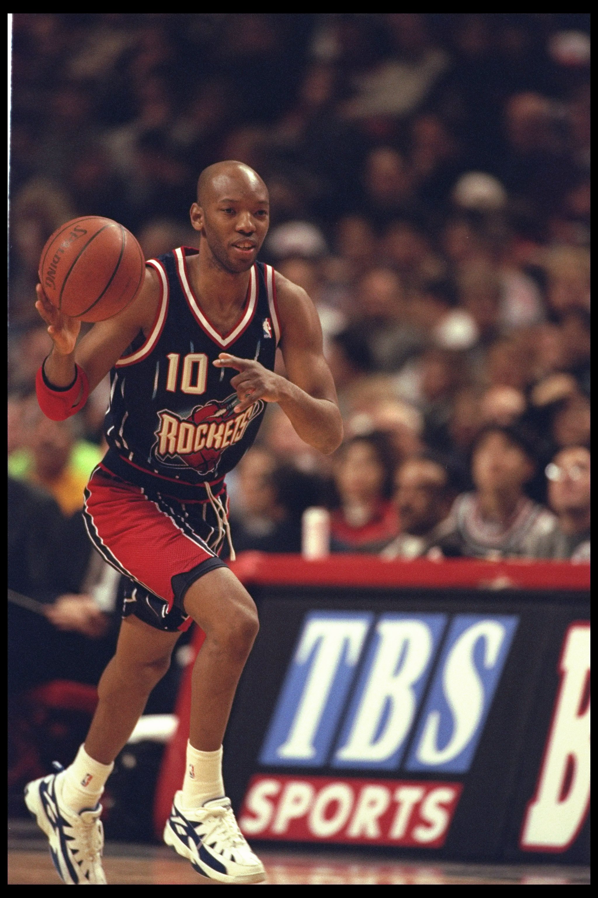 3 Jan 1996:  Sam Cassell of the Houston Rockets runs with the ball against the Chicago Bulls during a game played at the United Center in Chicago, Illinois.  The Bulls won the game, 100-86. Mandatory Credit: Jonathan Daniel/Allsport