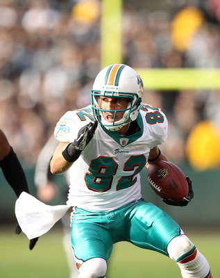 BRIAN HARTLINE MIAMI DOLPHINS ACTION SIGNED 8x10