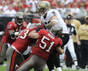 TAMPA, FL - NOVEMBER 30: Linebacker Barrett Ruud #51 of the Tampa Bay Buccaneers tackles tight end Jeremy Shockey #88 of the New Orleans Saints at Raymond James Stadium on November 30, 2008 in Tampa, Florida.  (Photo by Al Messerschmidt/Getty Images)