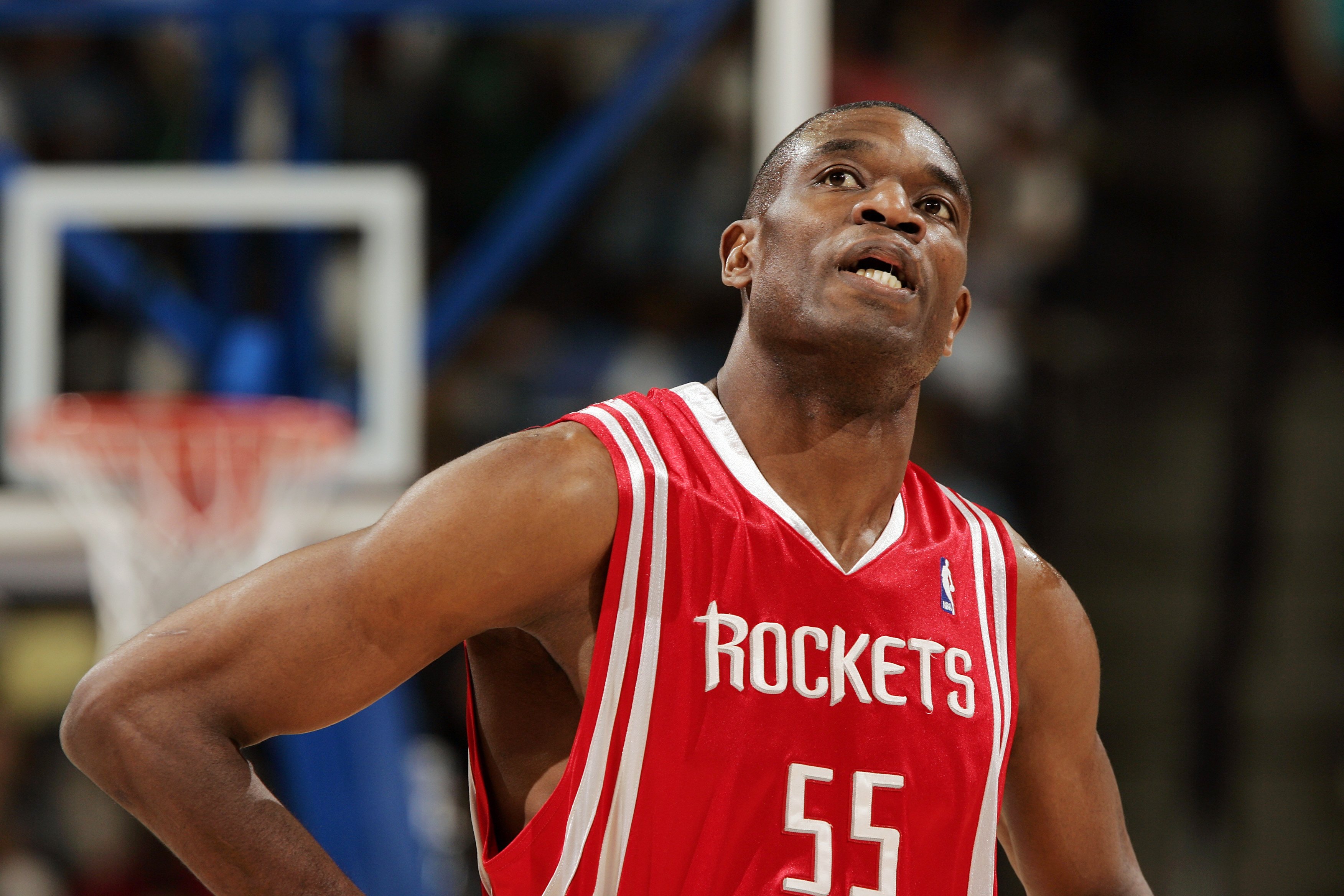 DENVER - APRIL 17:  Dikembe Mutombo #55 of Houston Rockets looks up at the clock in the fourth quarter against the Denver Nuggets on April 17, 2006 at the Pepsi Center in Denver, Colorado. The Rockets won 86-83.  NOTE TO USER: USER expressly acknowledges
