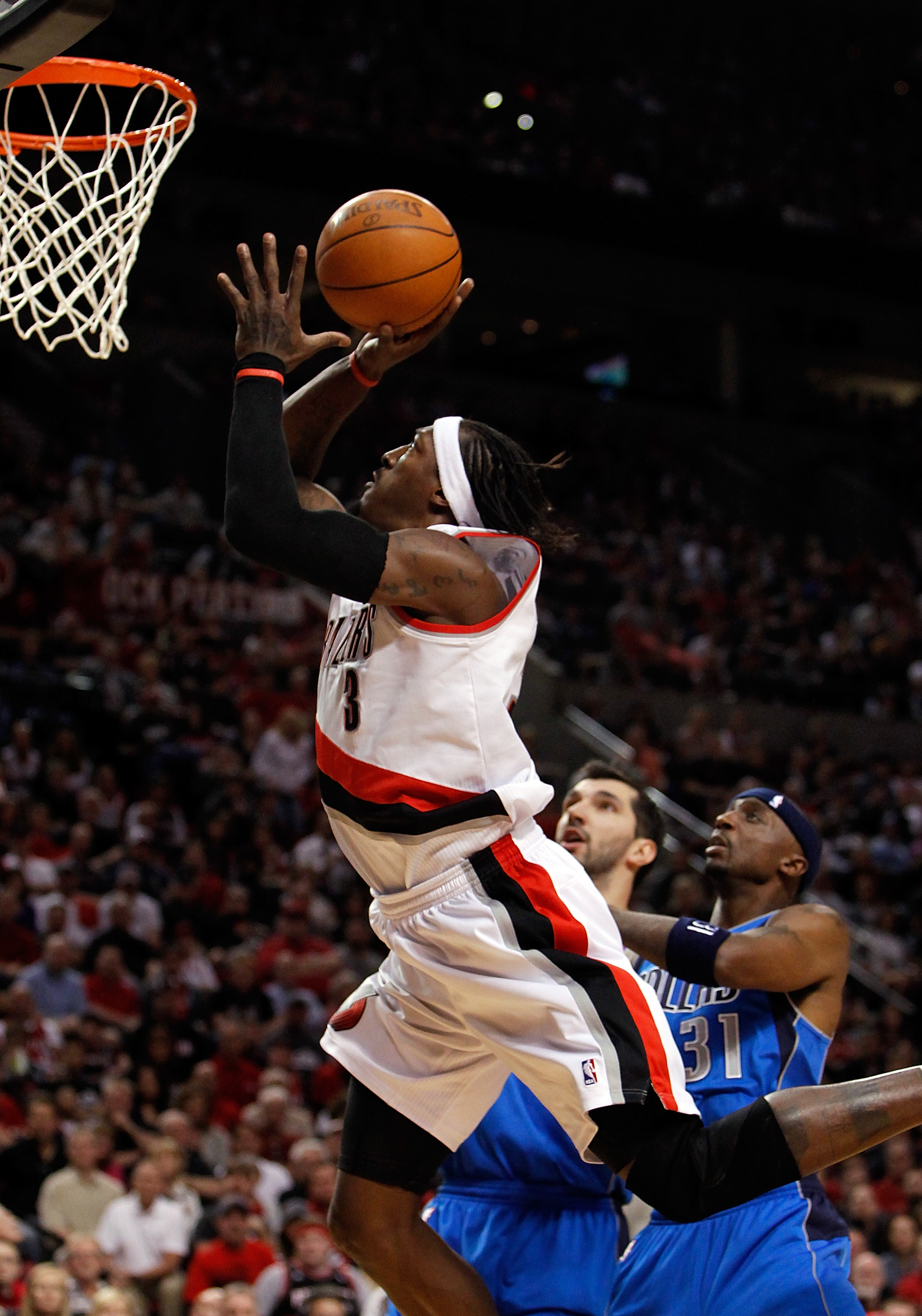 PORTLAND, OR - APRIL 23:  Gerald Wallace #3 of the Portland Trail Blazers lays up the ball against the Dallas Mavericks in Game Four of the Western Conference Quarterfinals in the 2011 NBA Playoffs on April 23, 2011 at the Rose Garden in Portland, Oregon.