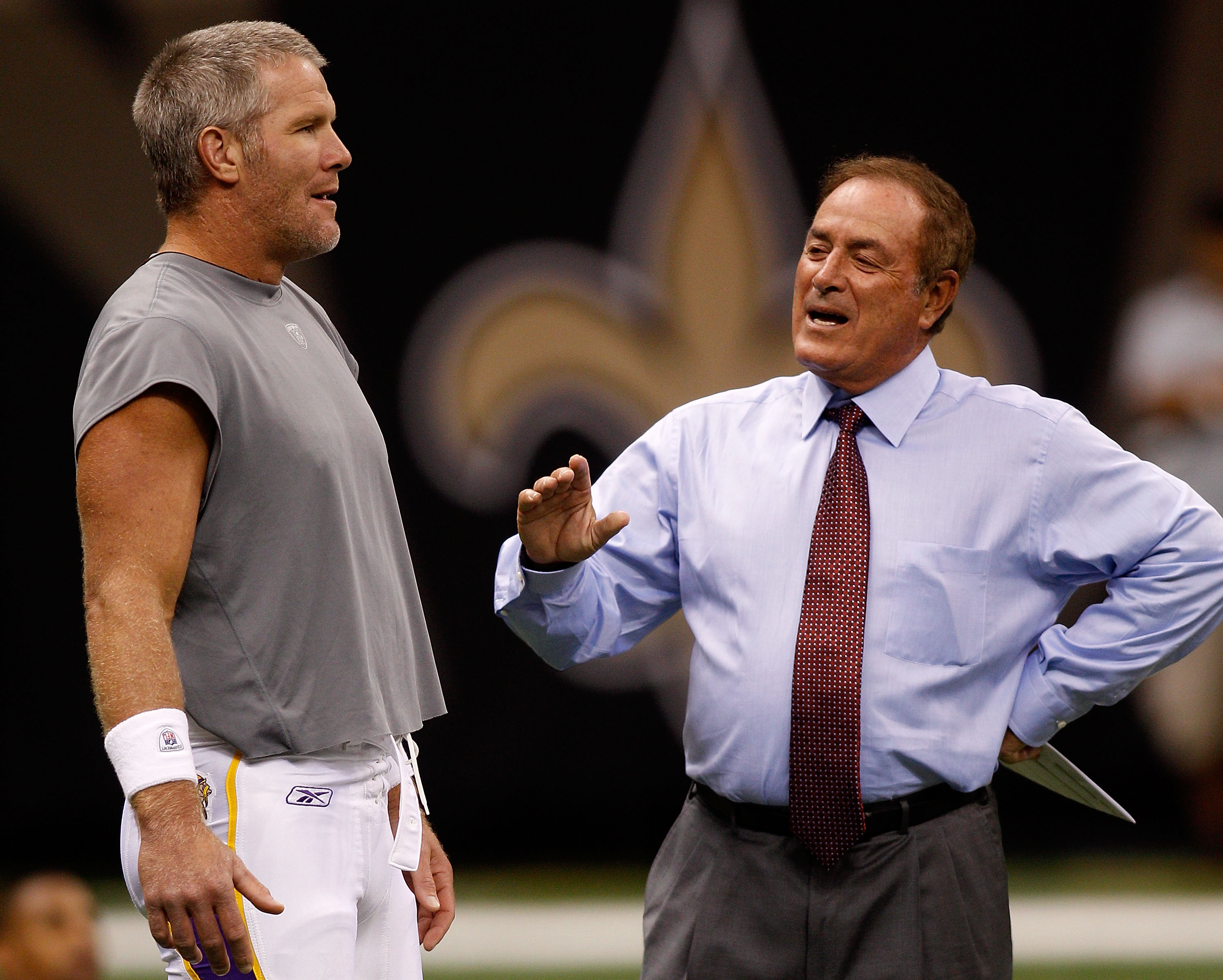 NEW ORLEANS - SEPTEMBER 09:  Quarterback Brett Favre #4 of the Minnesota Vikings talks with NFL TV analyast Al Michaels during warms up against the New Orleans Saints at Louisiana Superdome on September 9, 2010 in New Orleans, Louisiana.  (Photo by Chris
