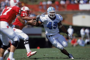 29 Sep 2001:  Julius Peppers #49 of the University of North Carolina Tar Heels avoids getting tackled during the game against the North Carolina State University Wolfpack at the Carter Finley Stadium in Raleigh, North Carolina.  The Tar Heels defeated the