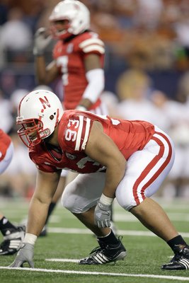 ARLINGTON, TX - DECEMBER 5: Ndamukong Suh #93 of the Nebraska Cornhuskers gets ready at the line during Big 12 Football Championship game against the Texas Longhorns at Cowboys Stadium on December 5, 2009 in Arlington, Texas. (Photo by Jamie Squire/Getty